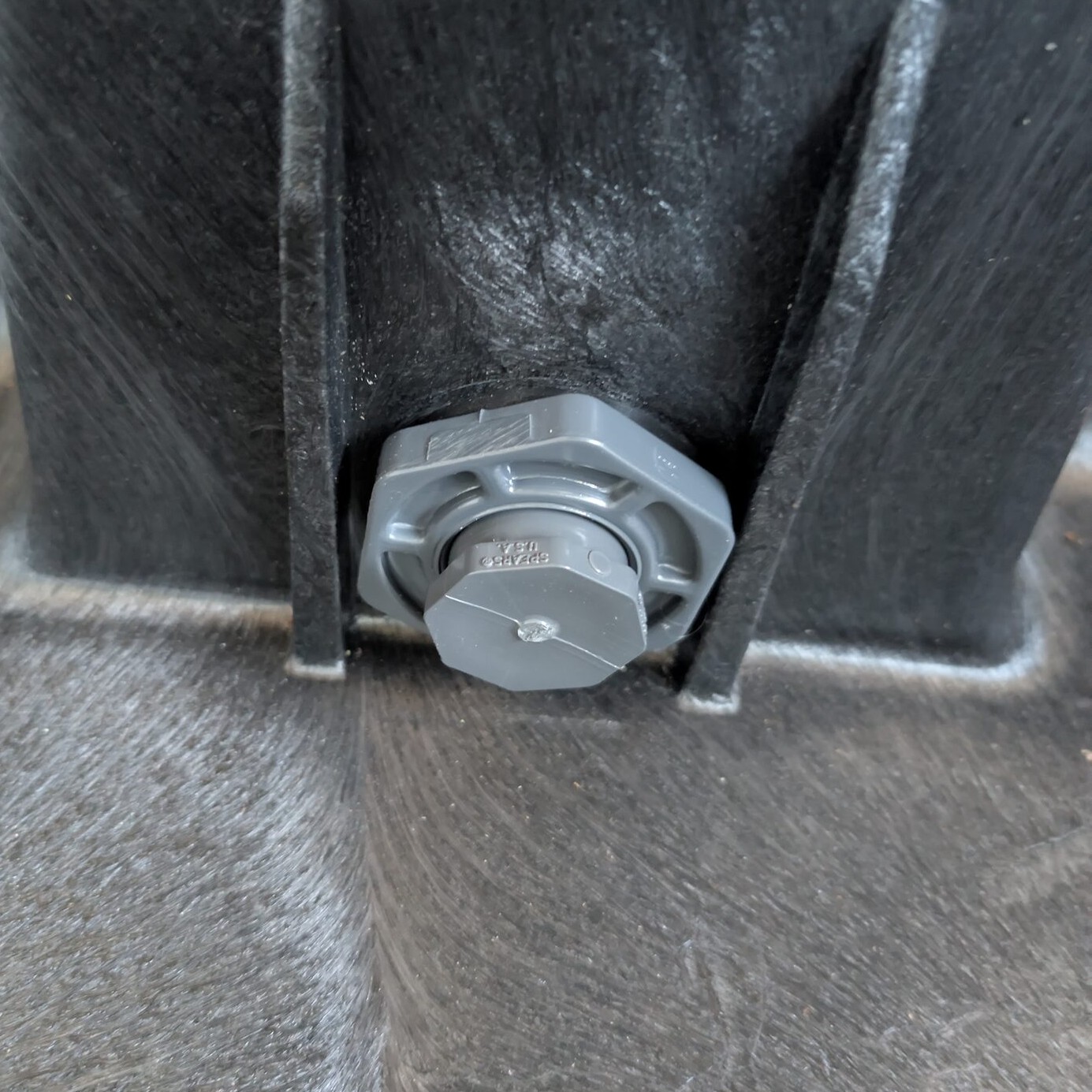 May 13. The stock bulkhead swapped for a Schedule 80 Spears fitting with a plug cemented in. Overbuilt on purpose.